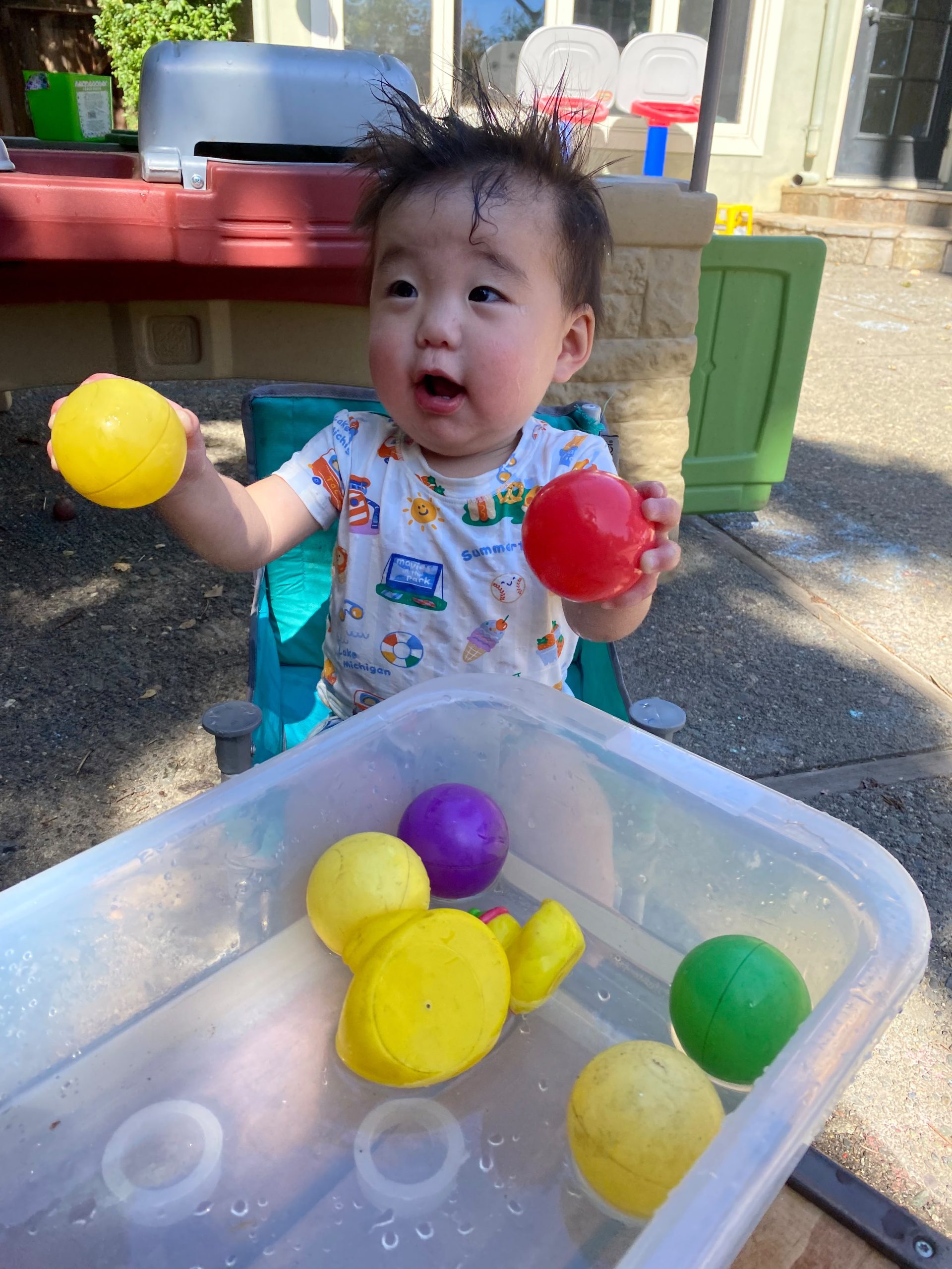 Toddler outdoor sensory water play and nature discovery at The Lighthouse Daycare Tiburon
